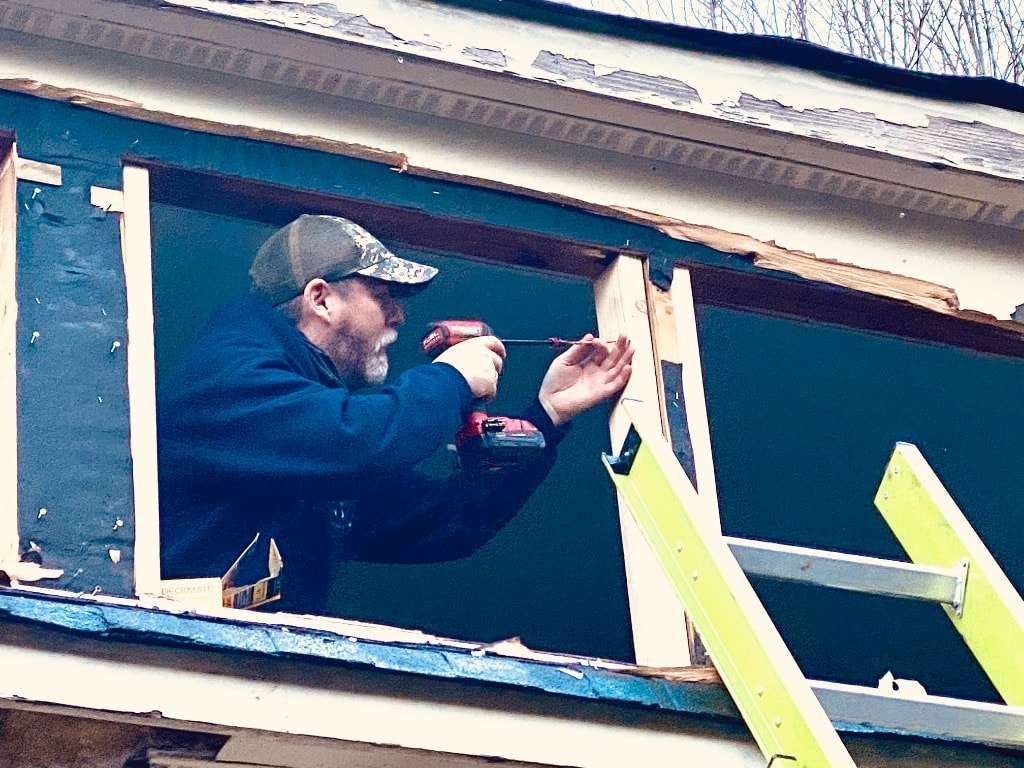 Murray Brothers crew installing exterior siding on a commercial building
